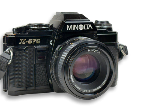 Minolta X-570 35mm film camera with a 50mm 1.7 prime lens