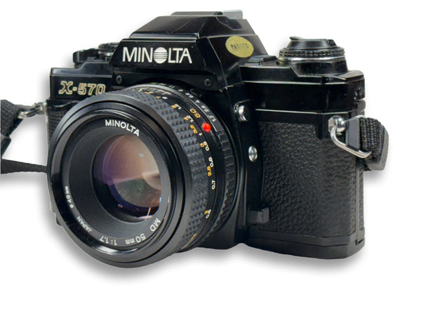 Minolta X-570 35mm film camera with a 50mm 1.7 prime lens