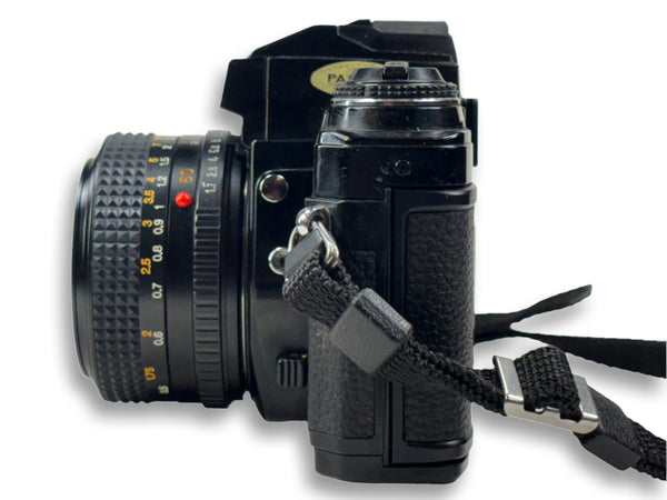 Minolta X-570 35mm film camera with a 50mm 1.7 prime lens