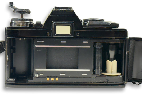 Minolta X-570 35mm film camera with a 50mm 1.7 prime lens