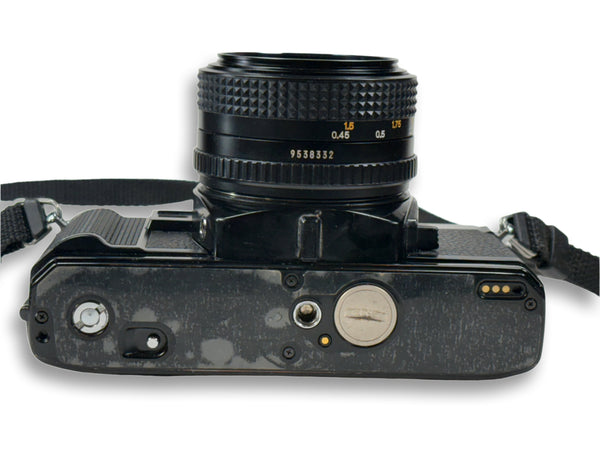 Minolta X-570 35mm film camera with a 50mm 1.7 prime lens