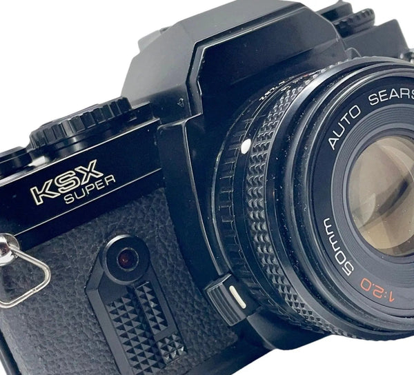 a close up of a camera on a white background